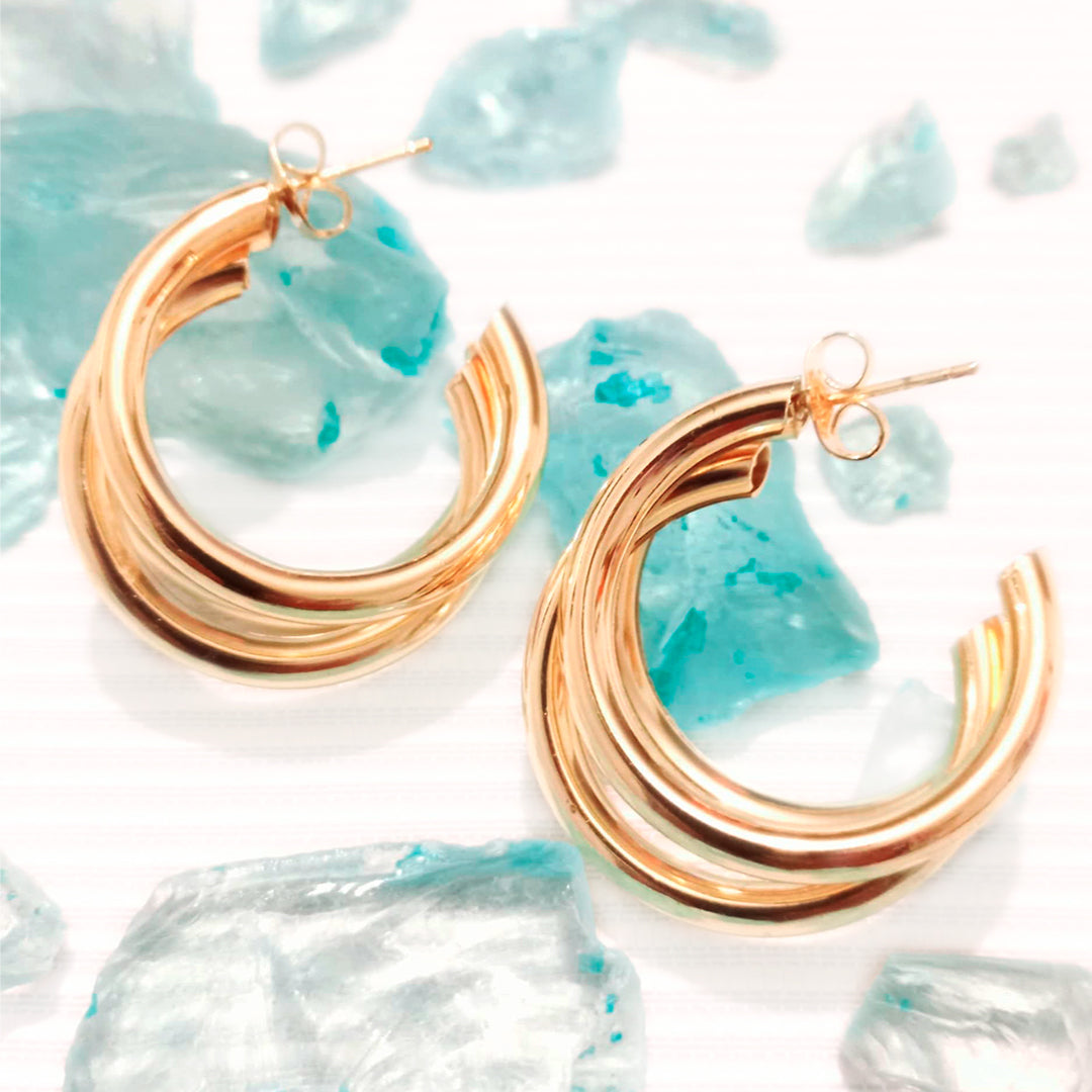 Aretes tríptico dorado