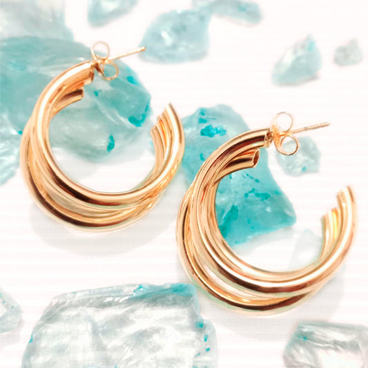 Aretes tríptico dorado