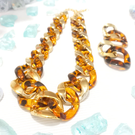 Juego de collar y aretes tipo carey