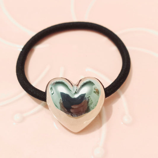 Sujetador de cabello corazón plateado